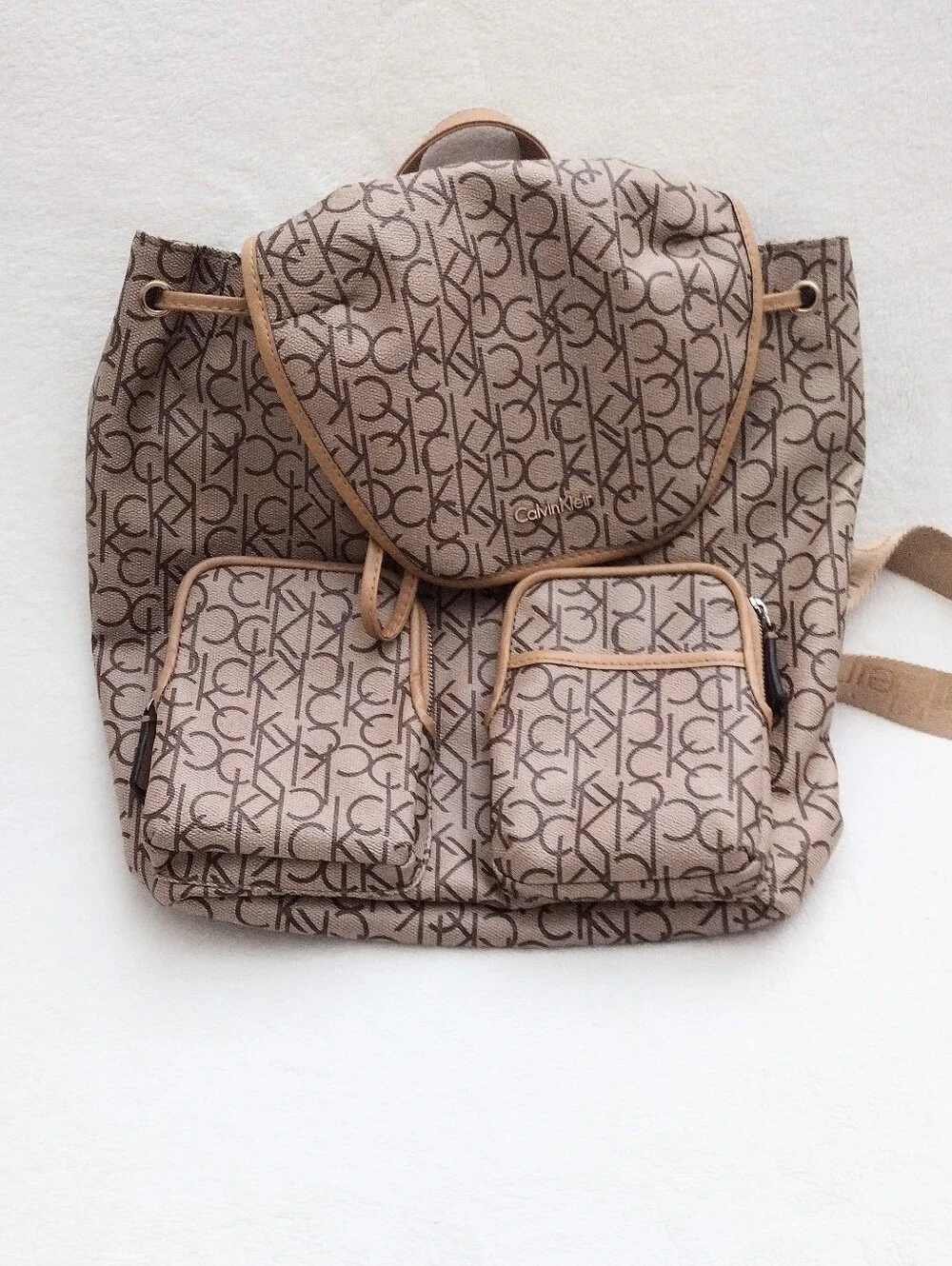 Calvin Klein Monogram Drawstring Backpack in Beige and Brown